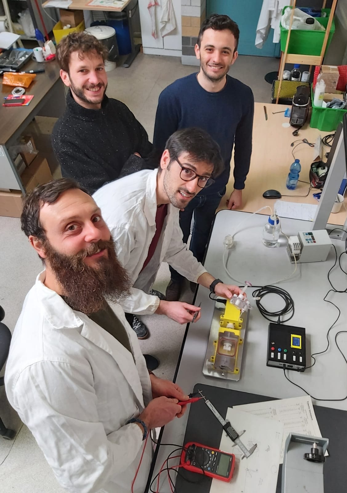 Researchers and bioreactors in the laboratory